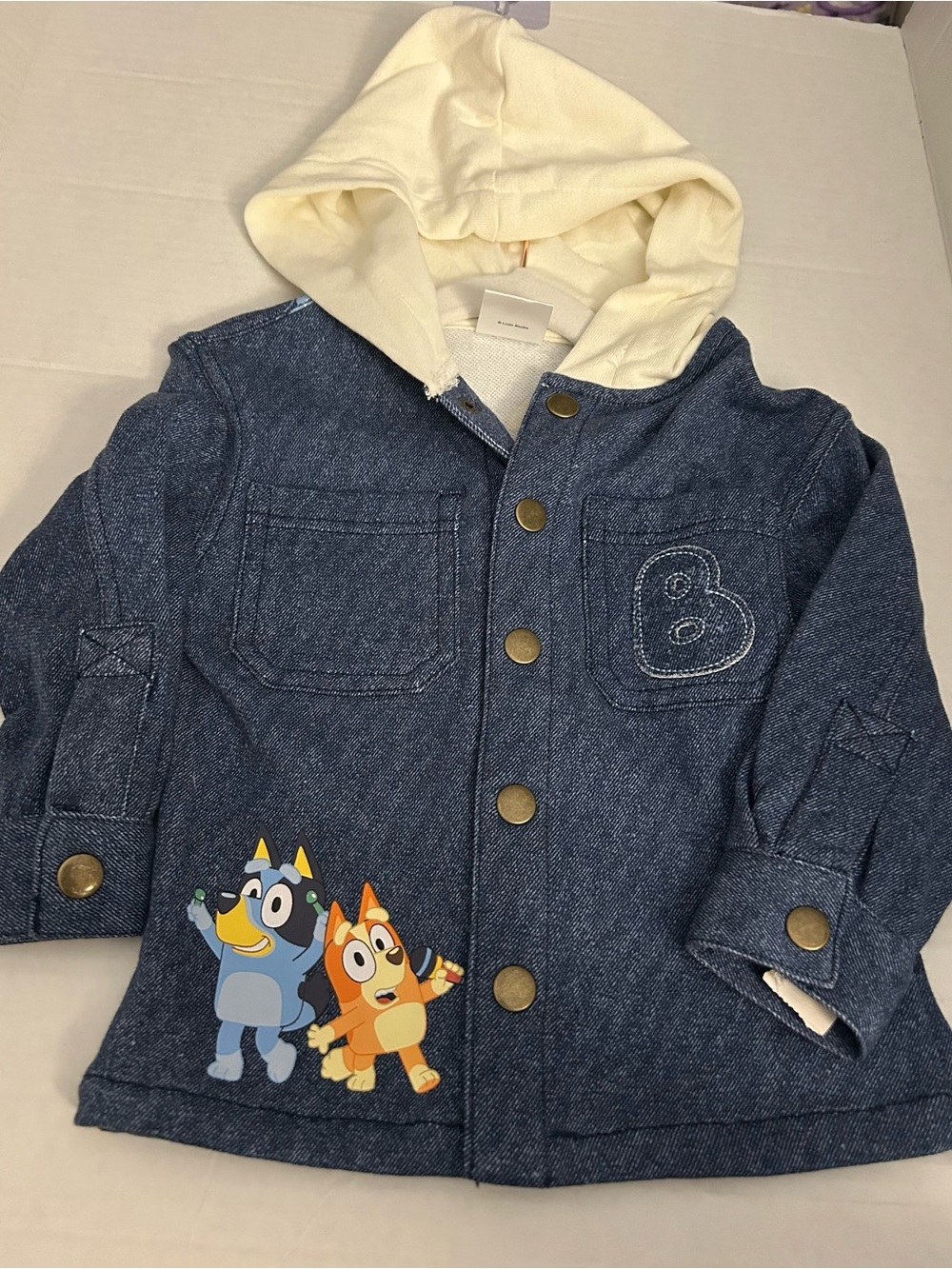 NWT Bluey hooded jacket, size 18 months. This dark blue denim-look jacket